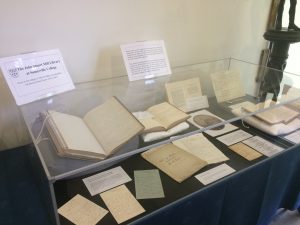 Displaying commemorating the gift of Mill's library to Somerville College.